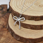 Antique Plated Coquette Bow Necklace On A Sterling Silver Saturn Chain. Bow Jewelry. Ribbon Jewelry. Coquette Jewelry.